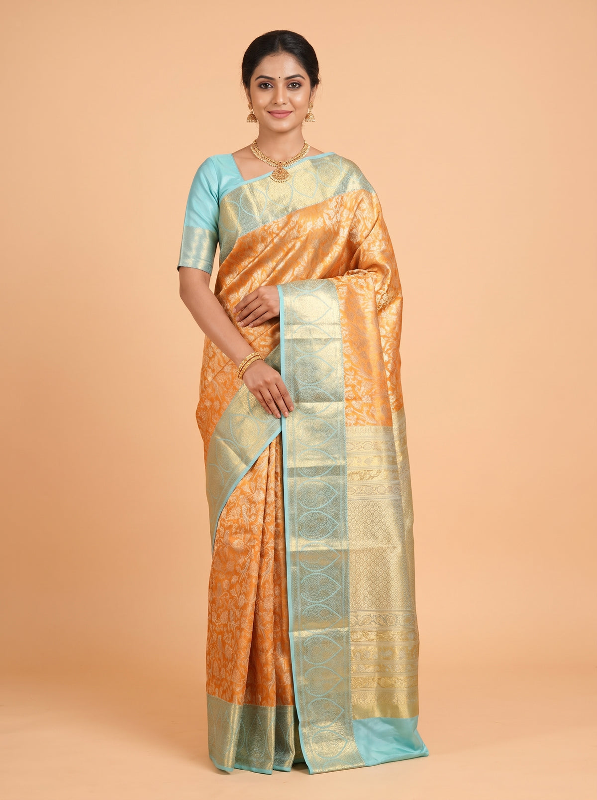 Orange Pure Kanjivaram Tissue Saree with Paisley Medallion Border with Diamond Floral Buttas