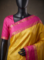 Mustard Yellow Semi Silk Saree with Rani Pink Gold Zari Border & Woven Buttas