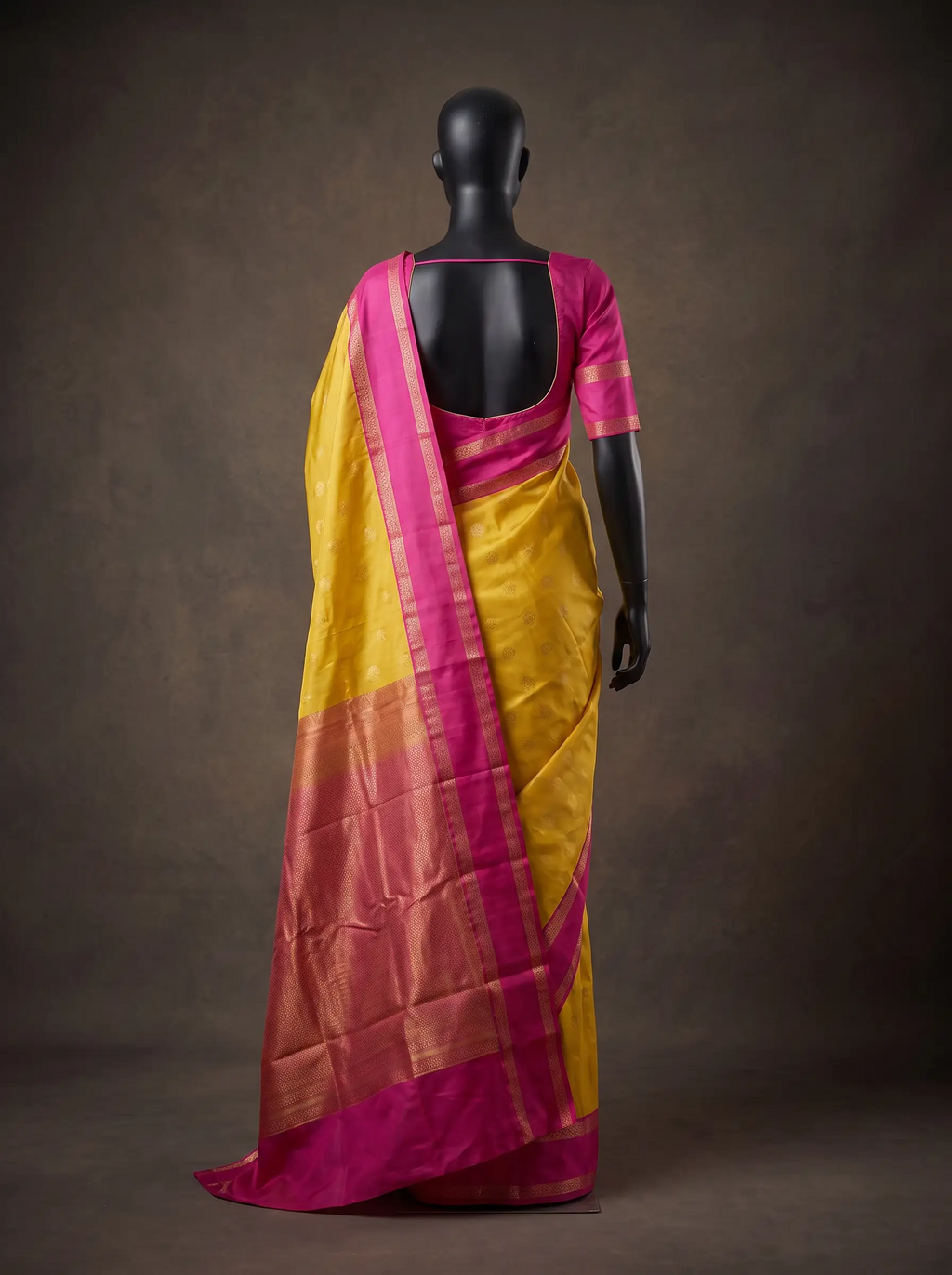 Mustard Yellow Semi Silk Saree with Rani Pink Gold Zari Border & Woven Buttas