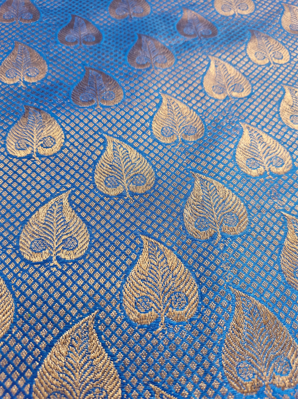 Dark Blue and Copper Zari Woven Semi Silk Saree