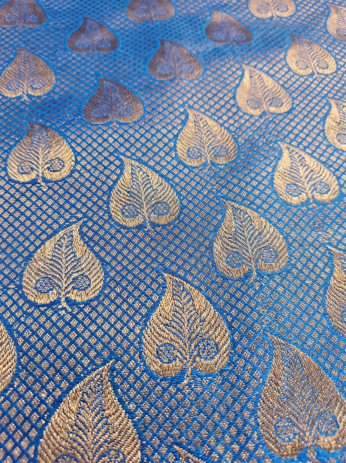 Dark Blue and Copper Zari Woven Semi Silk Saree