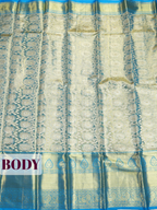 Blue Pure Kanchipuram Tissue silk Saree with Floral Geometric Zari Border