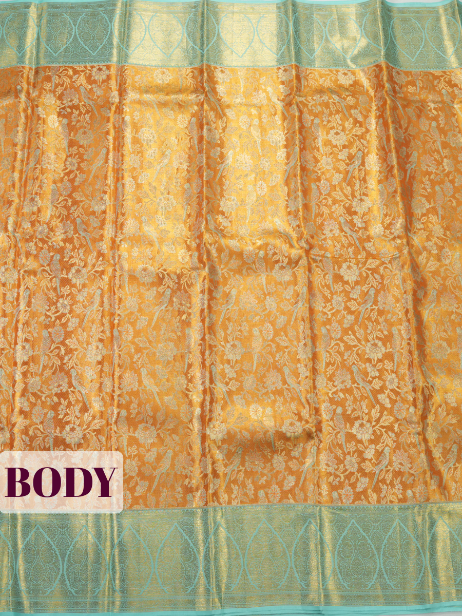 Orange Pure Kanjivaram Tissue Saree with Paisley Medallion Border with Diamond Floral Buttas