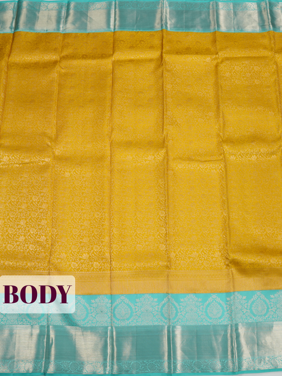 Yellow Kanchipuram Saree with Silver Zari Peacock Border