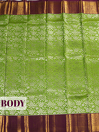 Parrot Green Kanchipuram Saree with Temple Zari Border