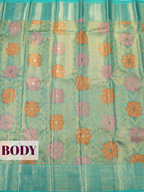 Teal Blue Pure Kanjivaram Tissue Saree with Floral Motif and Circular Vine Border