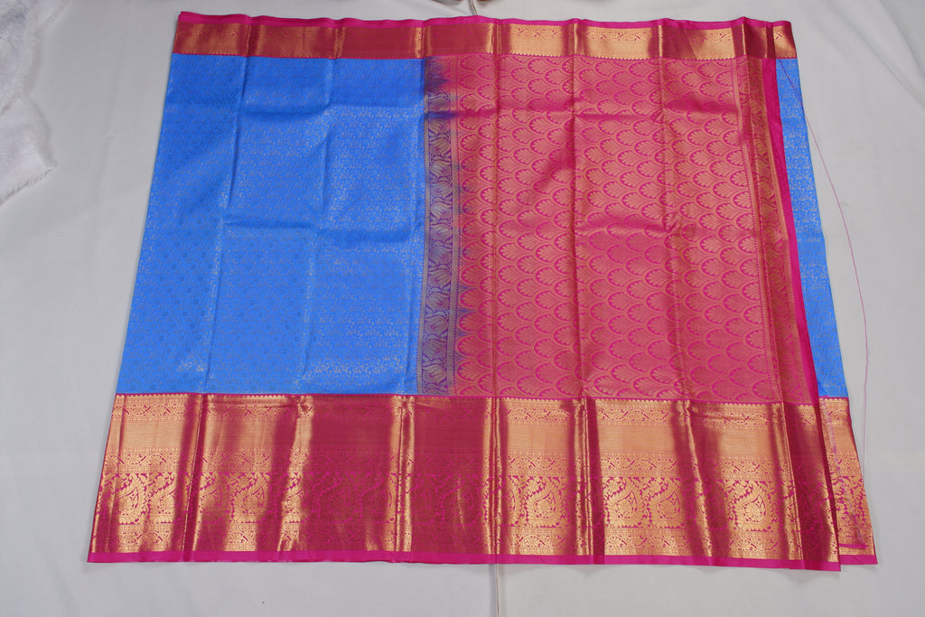 Green Tissue Brocade Saree with Rich Purple-Gold Paisley Pallu