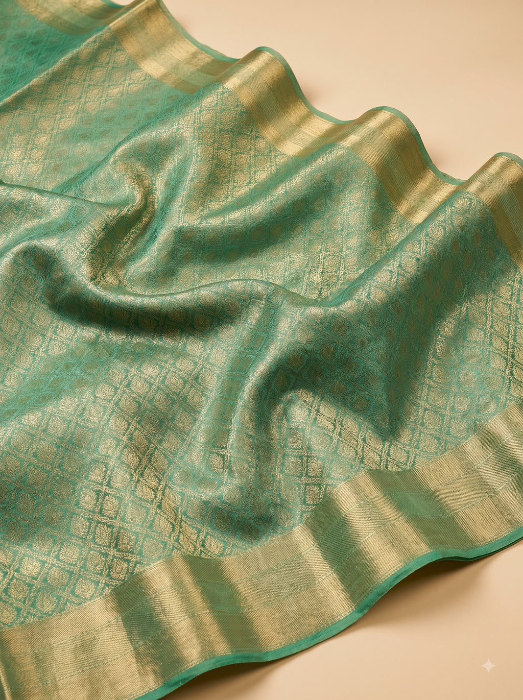Sea Green & Gold Georgette Saree with Shimmer Zari Weave