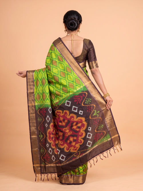 Black and Parrot Green Traditional Ikat Saree