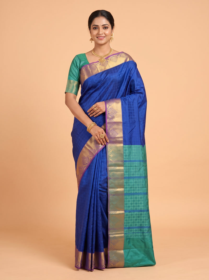 Turquoise Blue Silk Saree with Geometric Woven Pattern and Zari Paisley Border