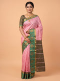 Soft Pink Silk Saree with Intricate Geometric Woven Texture and Ornate Floral Zari Detailing