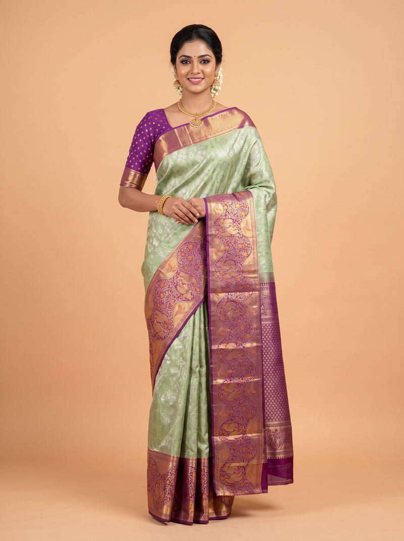 Parrot Green Kanchipuram Saree with Bird Motif Zari Border
