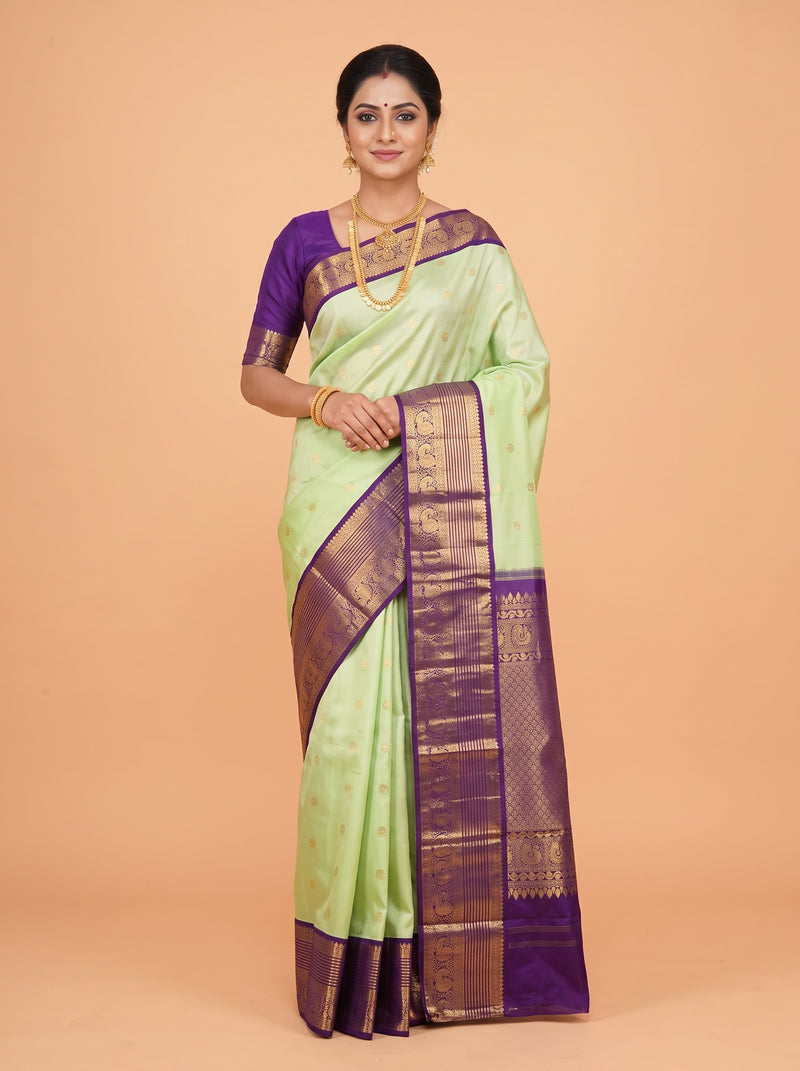 Parrot Green Kanchipuram Saree with Paisley Zari Border
