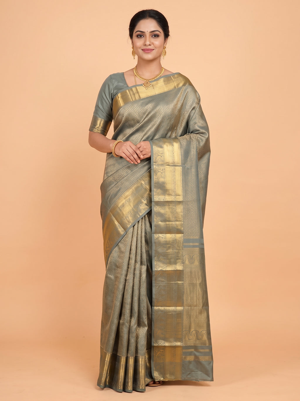 Green Kanchipuram Saree with Peacock and Floral Zari Border
