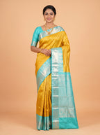 Yellow Kanchipuram Saree with Silver Zari Peacock Border
