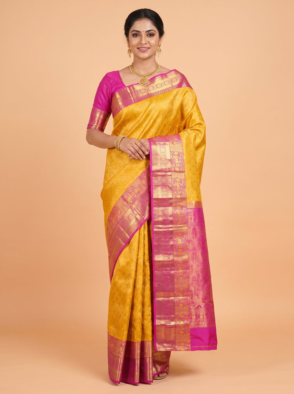 Yellow Kanchipuram Saree with Peacock and Temple-Arch Zari Border