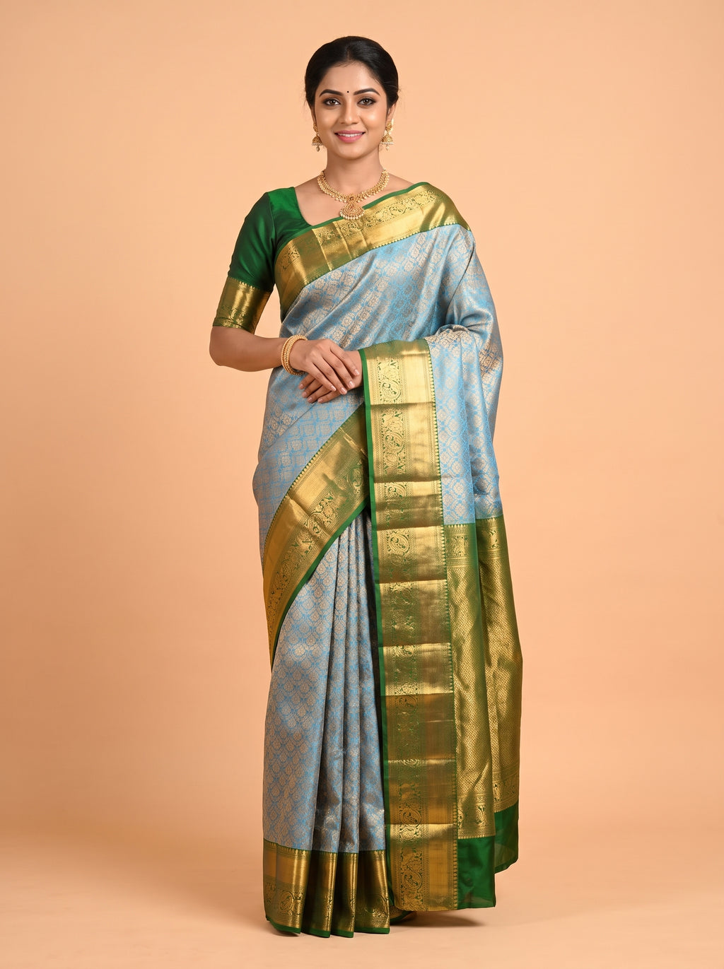 Blue Kanchivaram Saree with Ornate Peacock Border