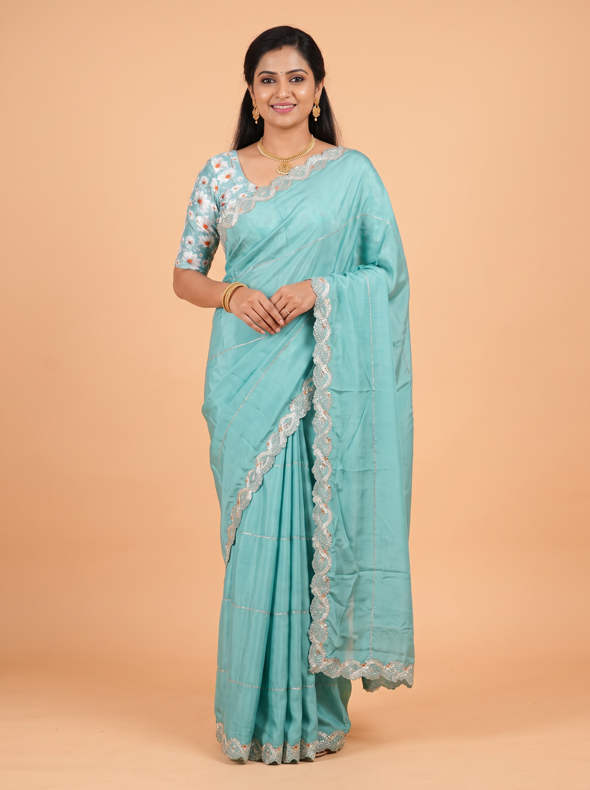 Sea Green Satin Fancy Saree with Stone-Studded Border Design