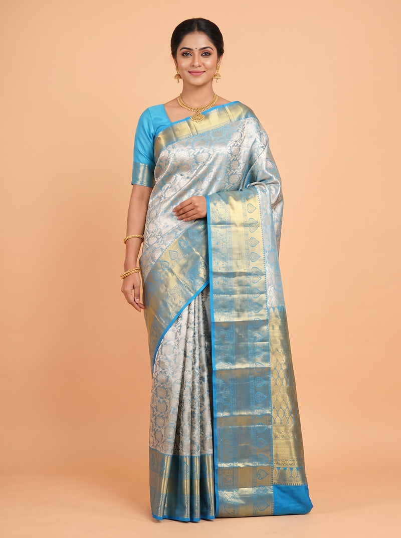 Blue Pure Kanchipuram Tissue silk Saree with Floral Geometric Zari Border