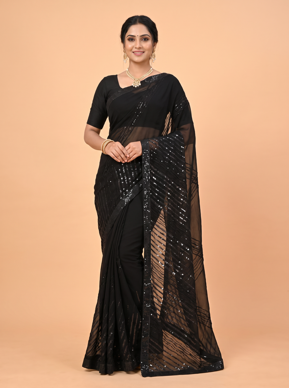 Black Fancy Georgette Saree with An embellished sequin and ruffle border