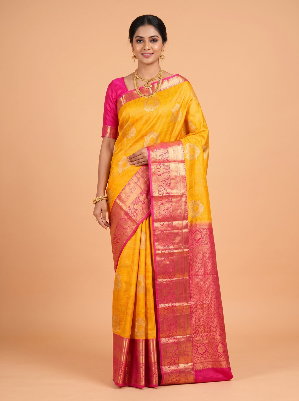 Mustard Yellow Semi Kanjivaram Brocade Silk Saree with A peacock-and-floral zari border
