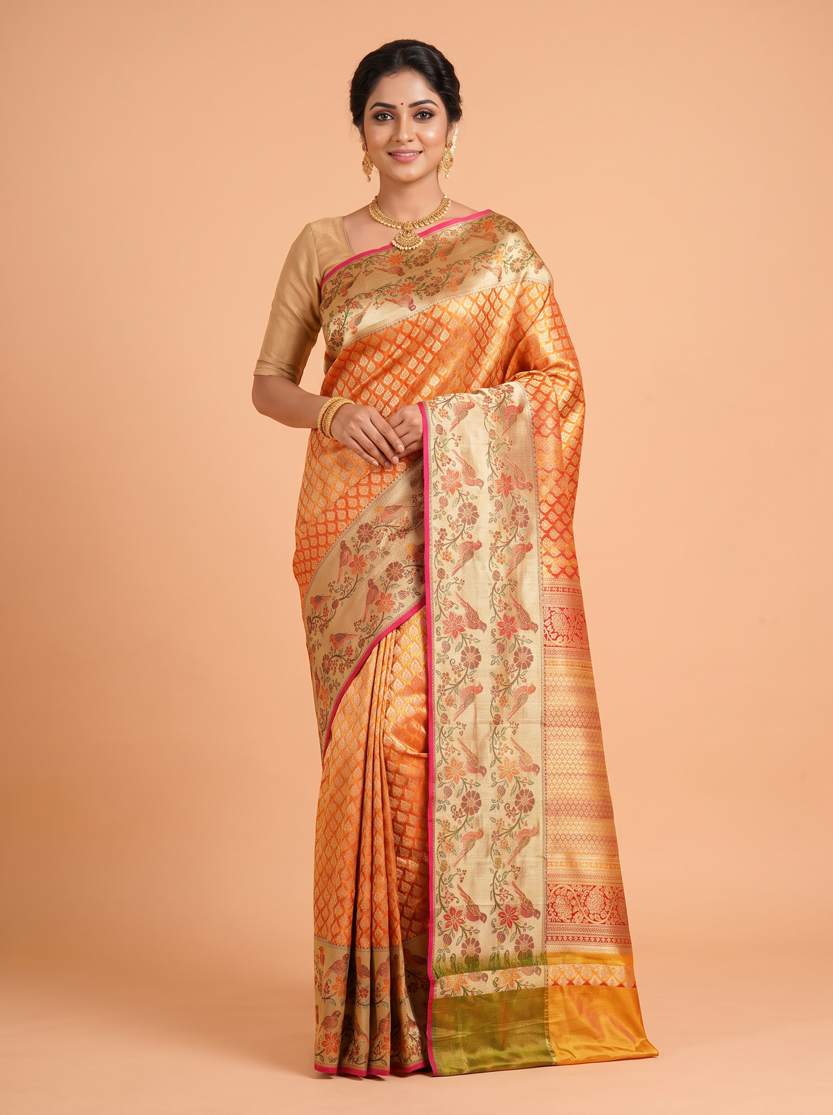 Orange Pure Kanjivaram Silk Saree with A Meenakari border with floral and bird motifs