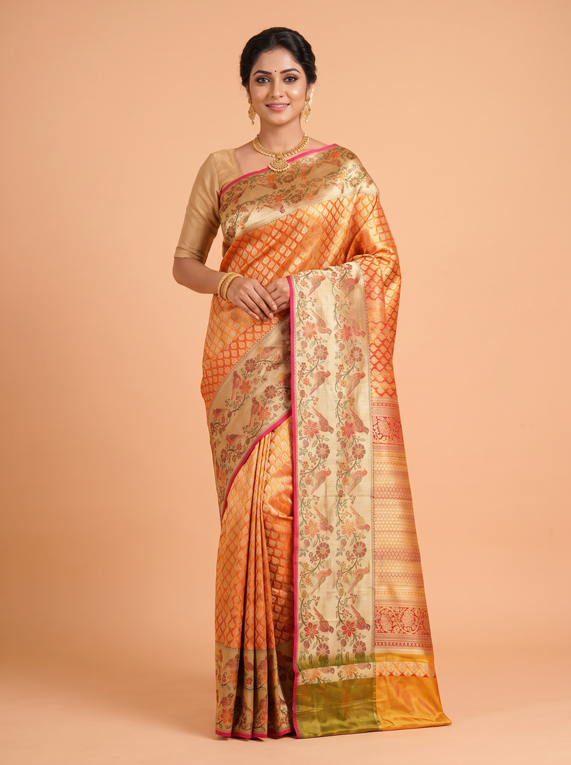 Orange Pure Kanjivaram Silk Saree with A Meenakari border with floral and bird motifs