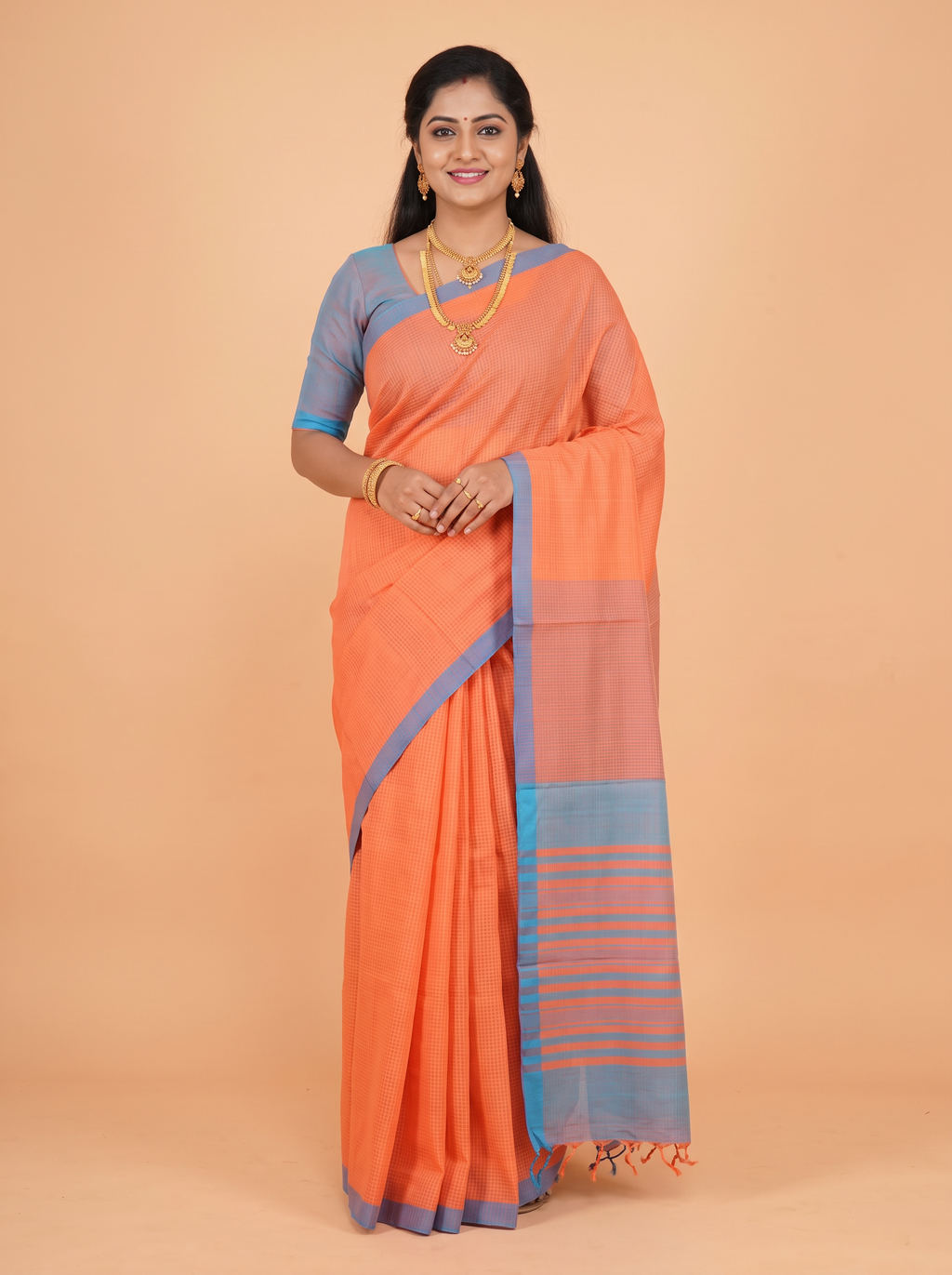 Orange Pure Cotton Saree with A minimalist tonal-tint border