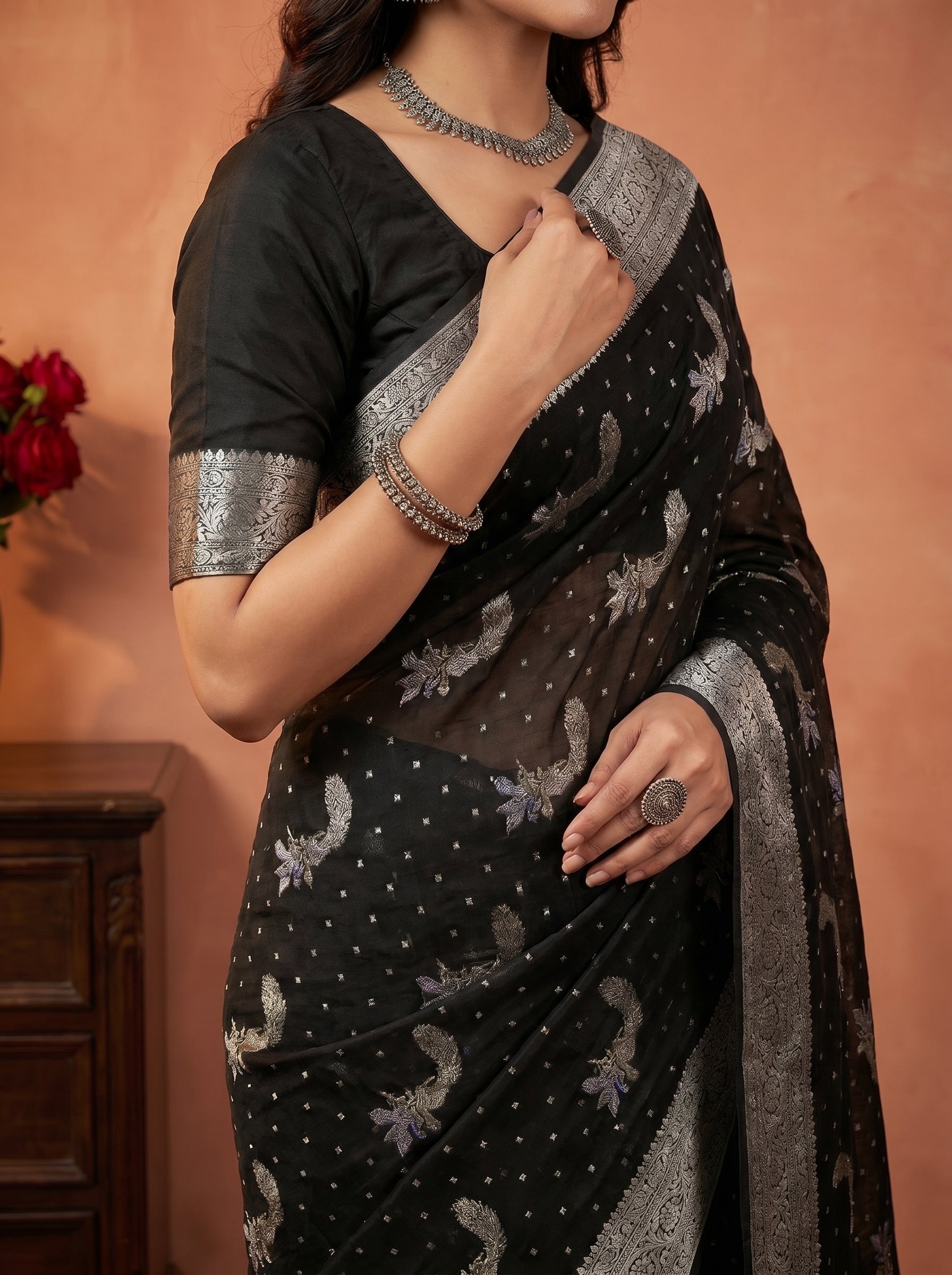 Mugdha Black Georgette Saree Peacock Motif Zari Border