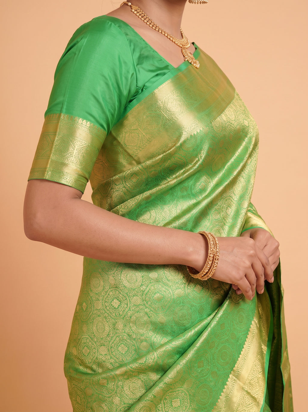 Emerald Green Silk Saree With Intricate Antique Gold Zari Buta & Rich Pallu