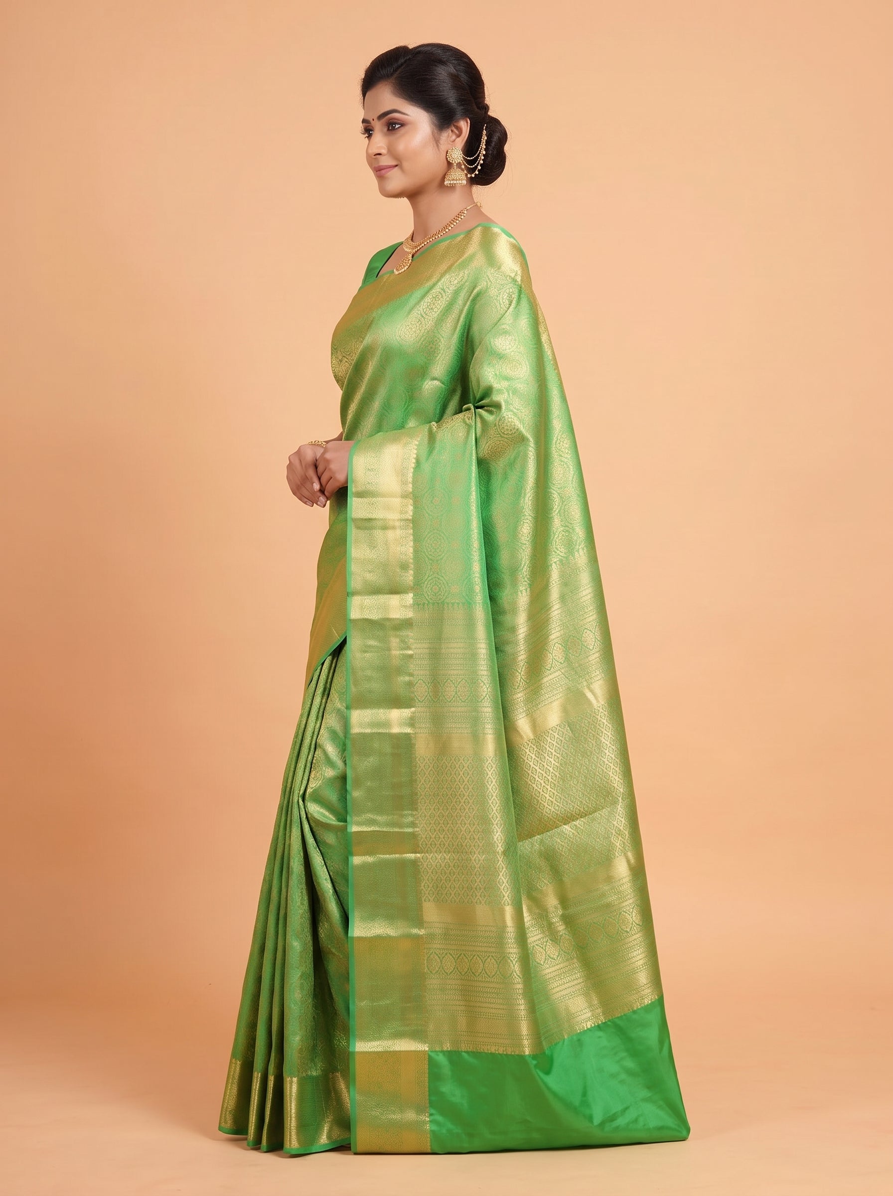 Emerald Green Silk Saree With Intricate Antique Gold Zari Buta & Rich Pallu