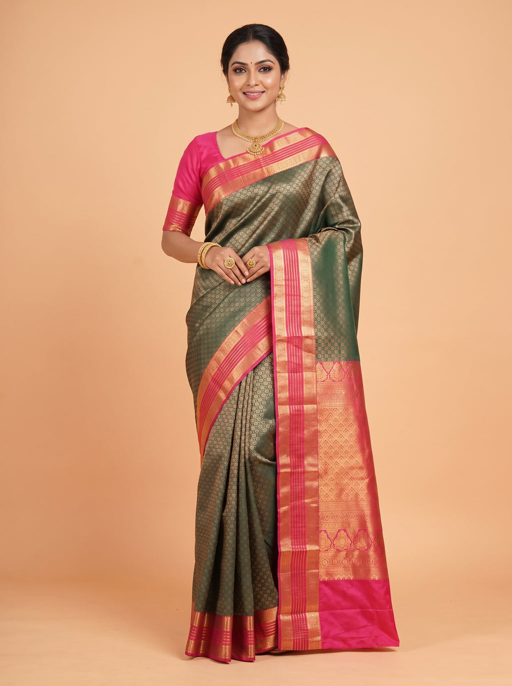 Teal  Green  Silk  Saree  With  Rani  Pink  Pallu  Intricate  Gold  Zari