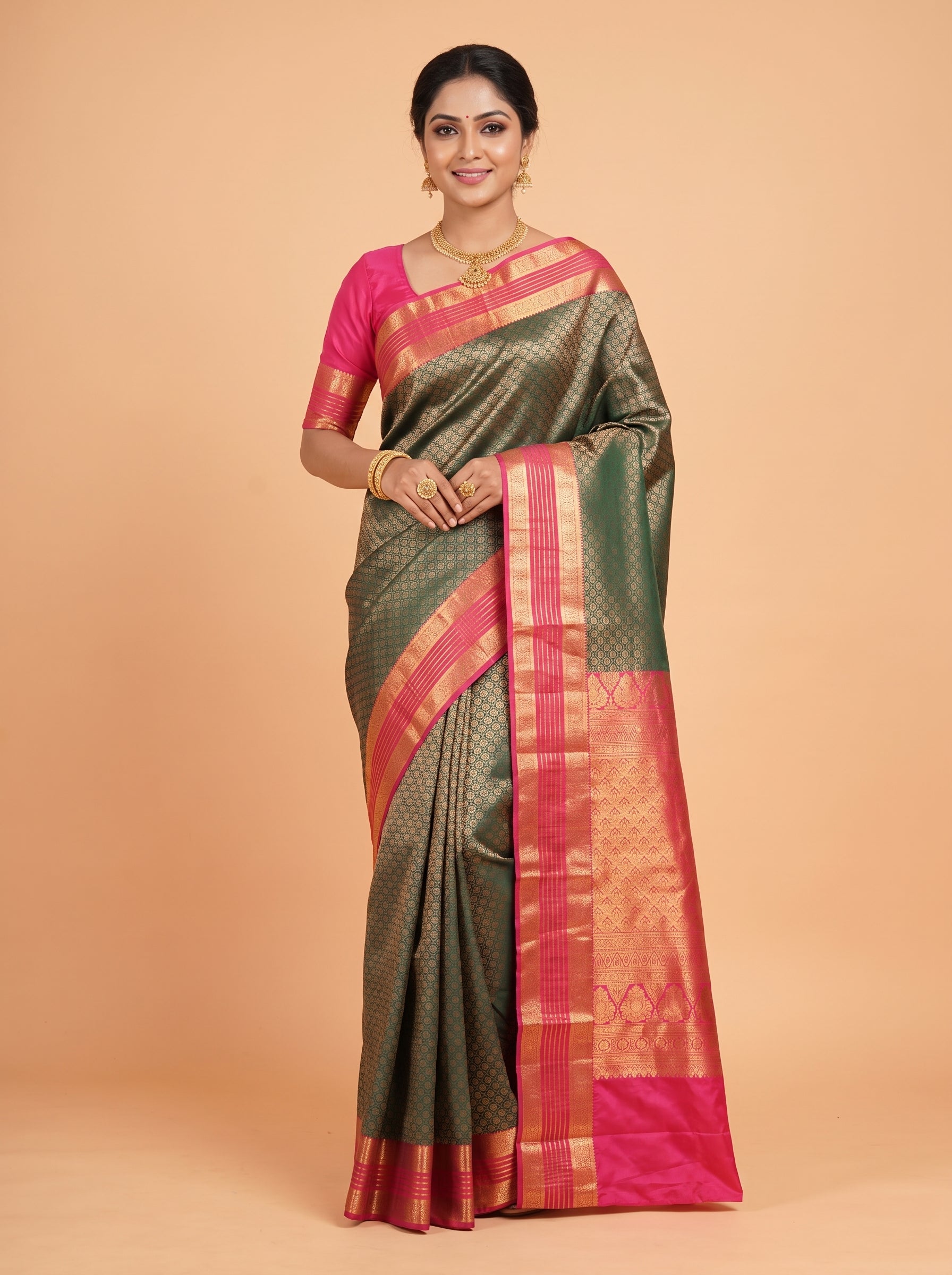 Teal  Green  Silk  Saree  With  Rani  Pink  Pallu  Intricate  Gold  Zari