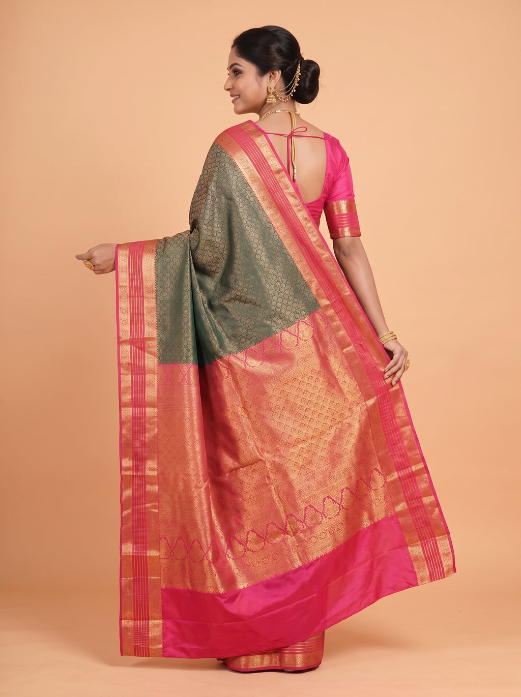 Teal  Green  Silk  Saree  With  Rani  Pink  Pallu  Intricate  Gold  Zari