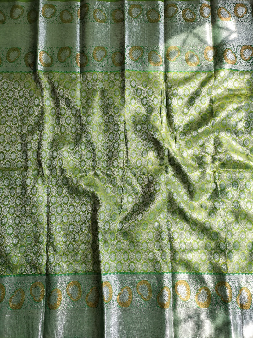 Olive Green Tissue Brocade Saree with Silver Zari Lotus Motifs