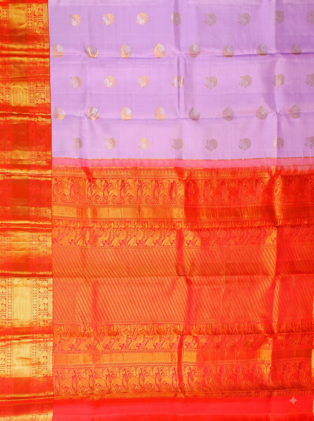 Premium silk saree in lavender with rich red zari temple border and woven traditional motifs