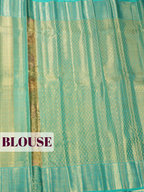 Teal Blue Pure Kanjivaram Tissue Saree with Floral Motif and Circular Vine Border