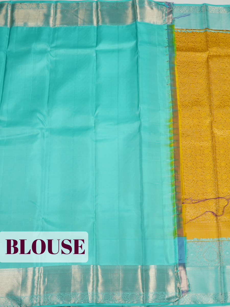 Yellow Kanchipuram Saree with Silver Zari Peacock Border