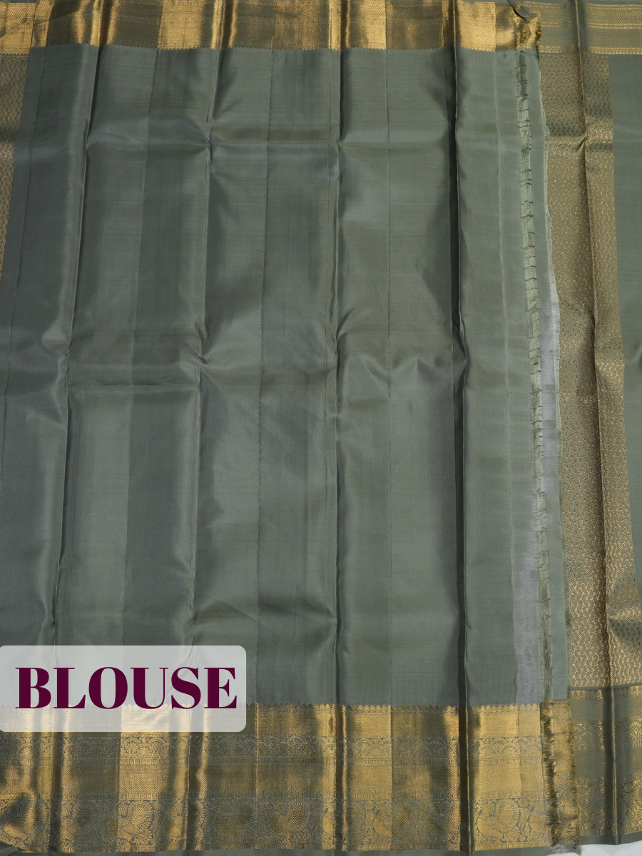 Green Kanchipuram Saree with Peacock and Floral Zari Border