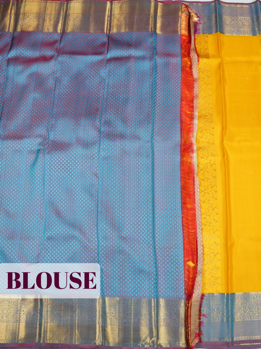 Yellow Kanchipuram Saree with Paisley and Floral Gold Zari Border