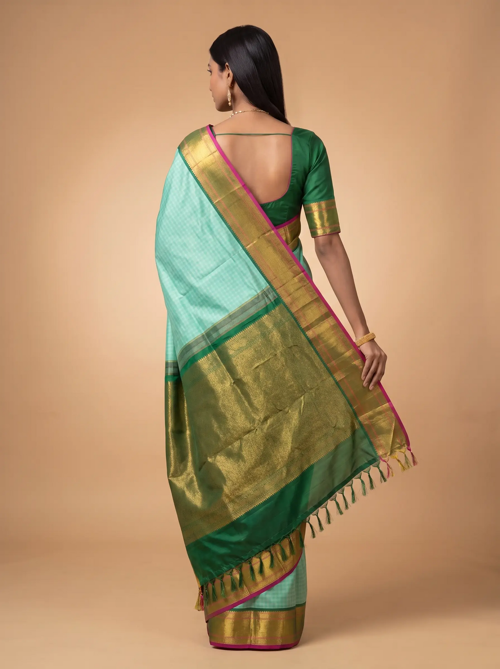 Mint Green Silk Saree with Antique Gold Zari & Magenta Border