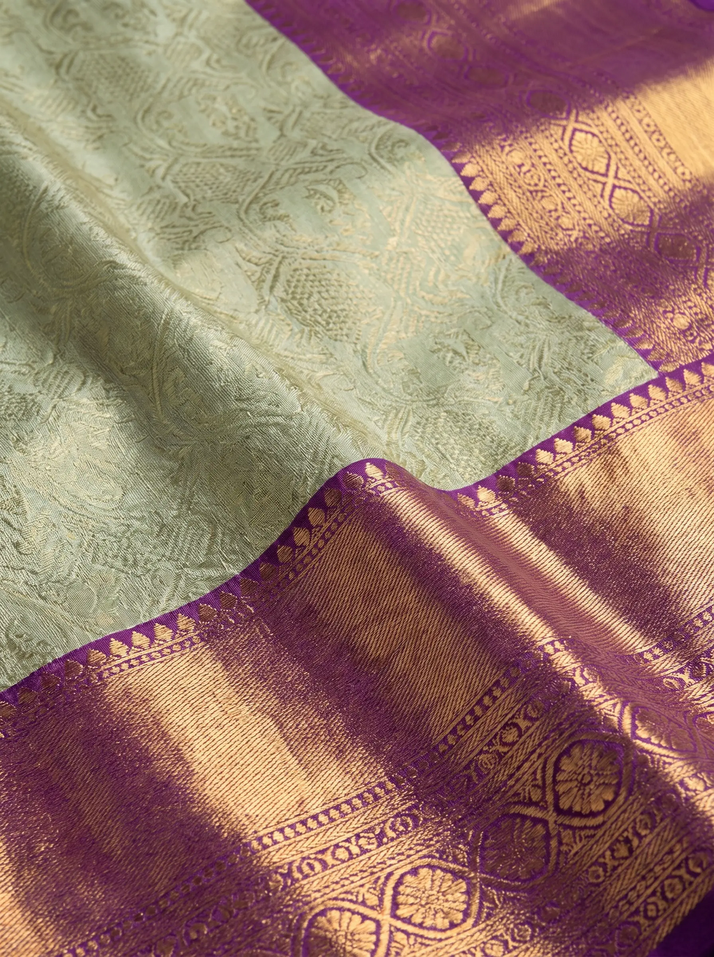 Royal Purple And Silver Grey Antique Gold Zari Woven Silk Saree