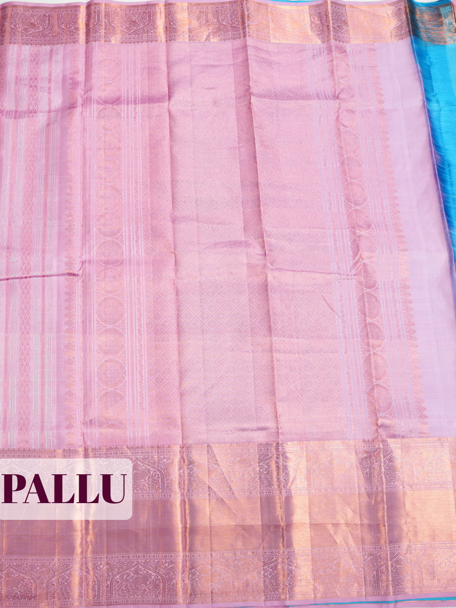 Pink Pure Kanjivaram Silk Saree with A copper-zari peacock and arch brocade border