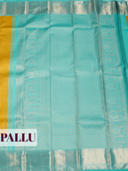 Yellow Kanchipuram Saree with Silver Zari Peacock Border