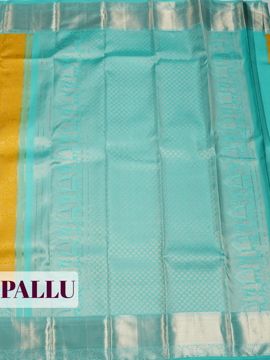Yellow Kanchipuram Saree with Silver Zari Peacock Border