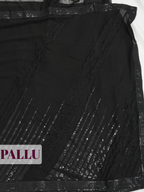 Black Fancy Georgette Saree with An embellished sequin and ruffle border