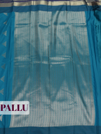 Turquoise Blue Silk Saree with Silver Butti Motifs and Woven Zari Pallu