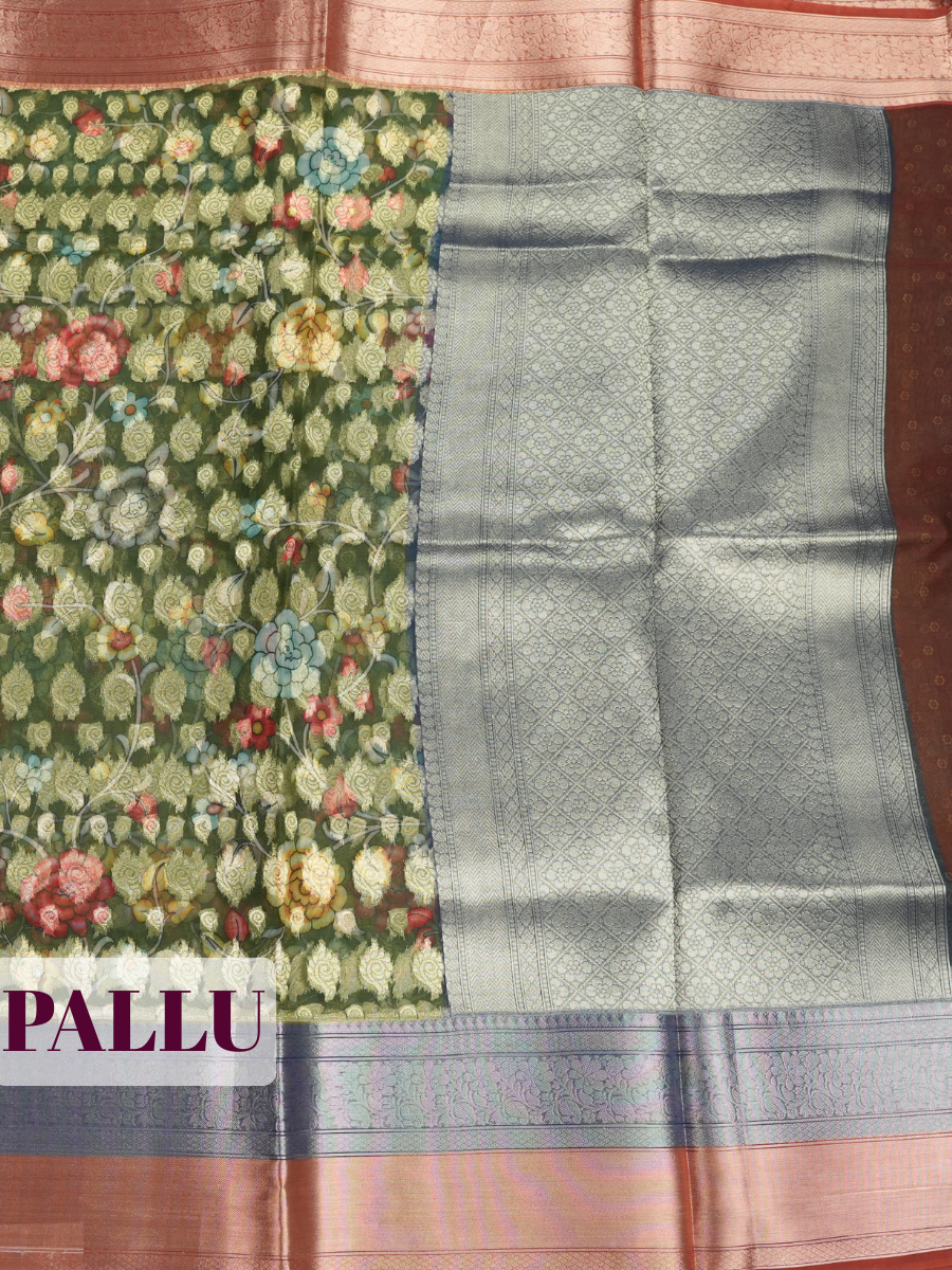 Green Semi Organza Saree with Dual tone zari with metallic lower plane