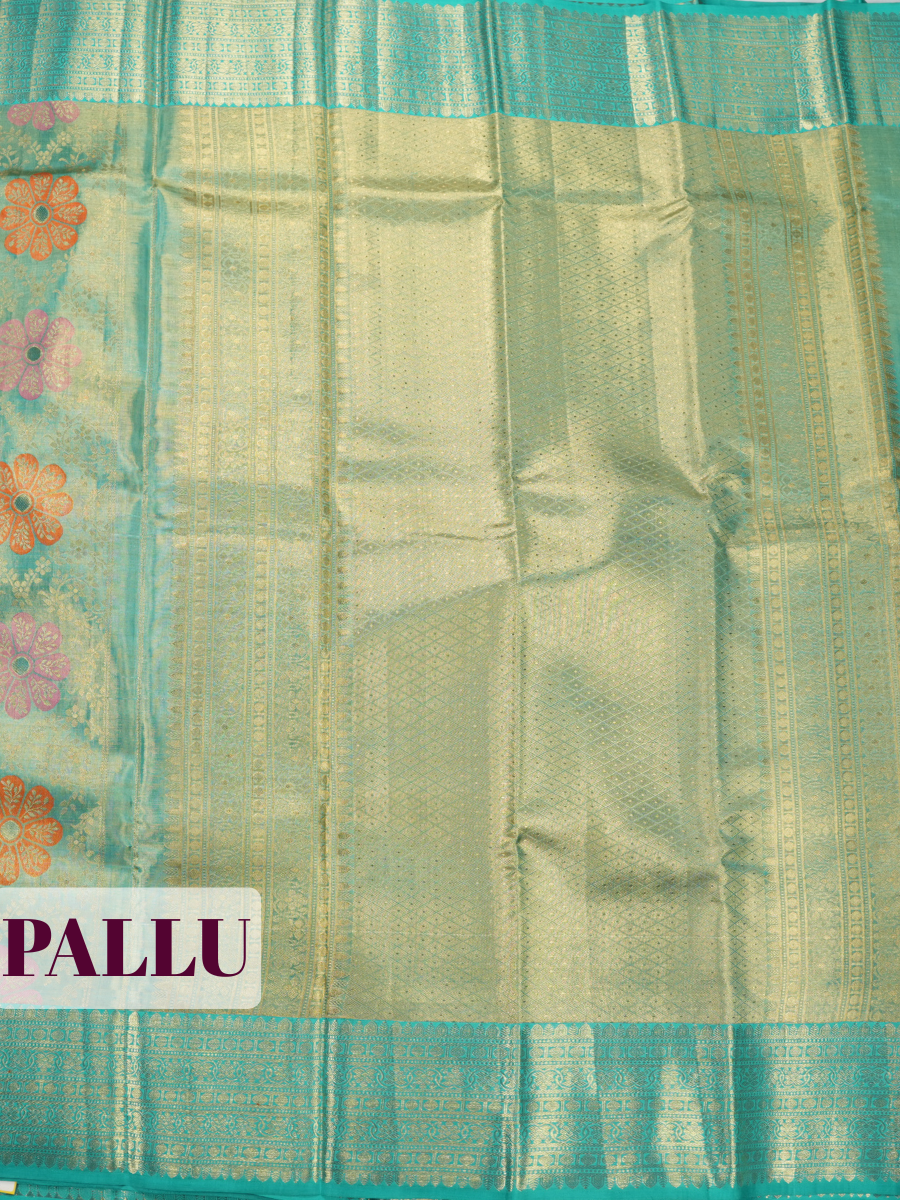 Teal Blue Pure Kanjivaram Tissue Saree with Floral Motif and Circular Vine Border