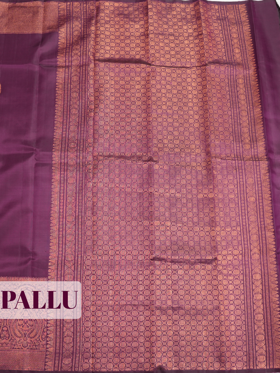 Magenta Purple Pure Kanjivaram Silk Saree with A copper-zari paisley brocade border